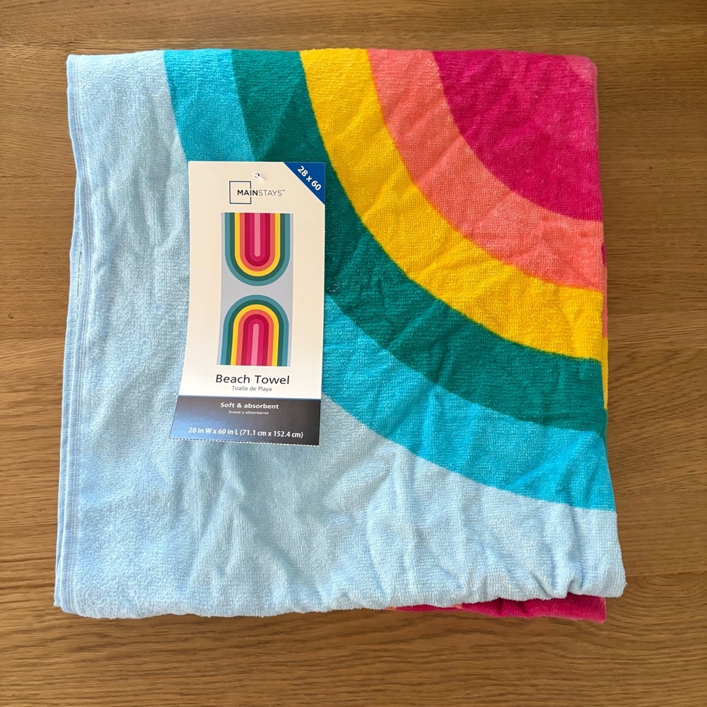Rainbow beach towel. 5/25$
